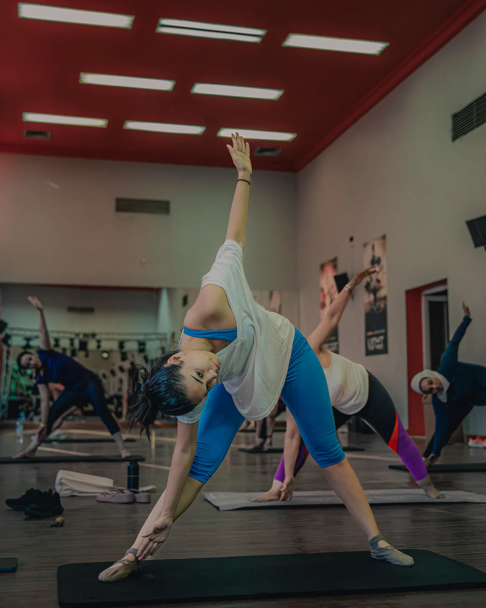 Triangle pose in a Les Mills Hatha Yoga class in Marrakech