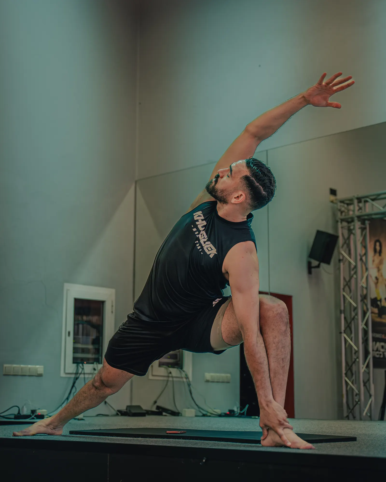 Side stretches in a yoga class at Canal Forme Marrakech